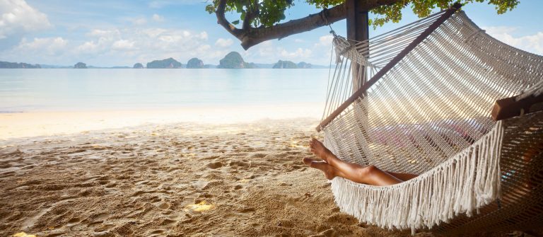 girl_at_the_beach_hammock_shutterstock_235622767_1920