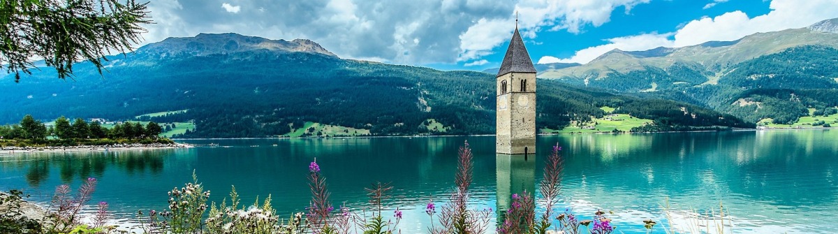 bell-tower-of-the-reschensee-resia-south-tyrol-italy-shutterstock_314553227-2
