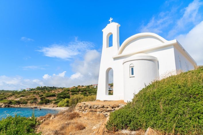White-Greek-church-on-coast-of-Samos-island-Greece-shutterstock_320738363_900x600