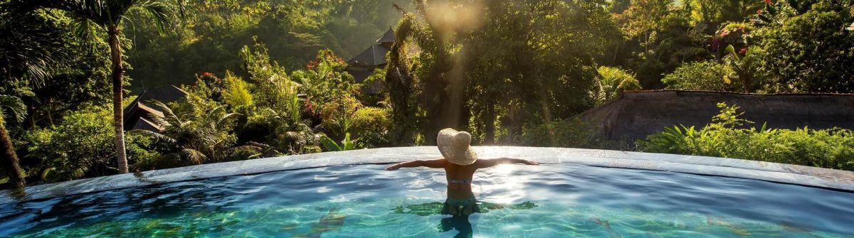 Bali-Infinity-PoolWoman-sunbathing-in-infinity-swimming-pool-at-luxurious-resort-shutterstock_489675709-smaller
